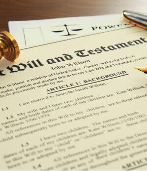 a picture of a last will and testament on a desk